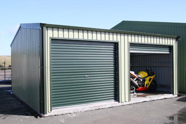 A building housing a yellow and white motorbike